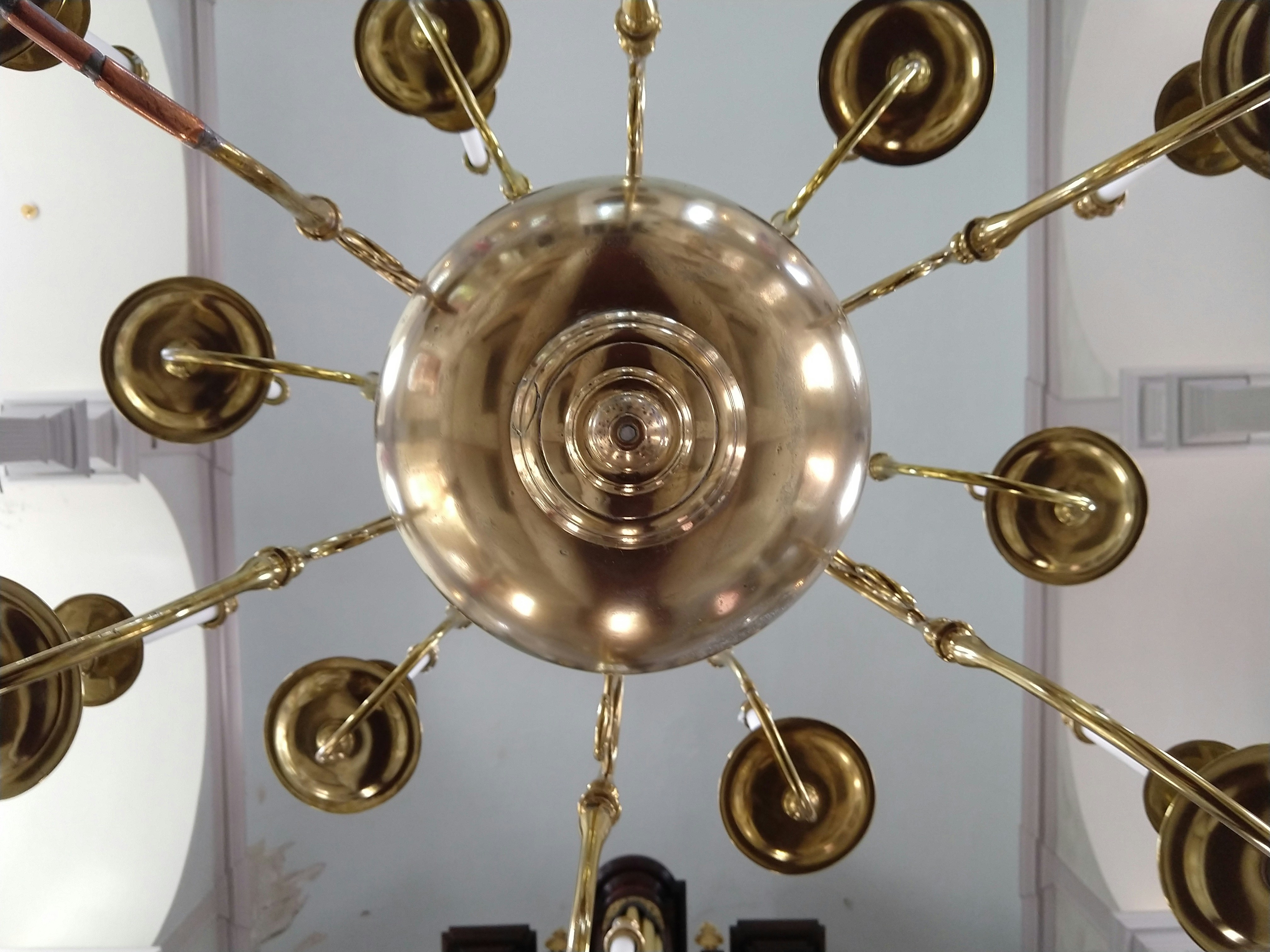 A chandelier with many round objects from it photo – Free Boston Image ...