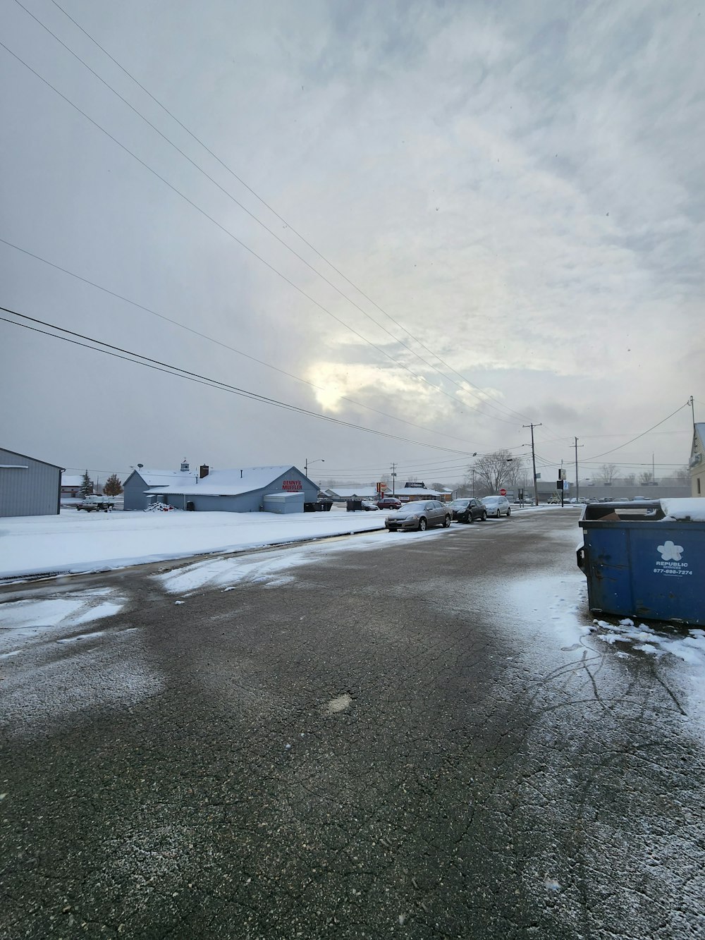 a road with snow on the side