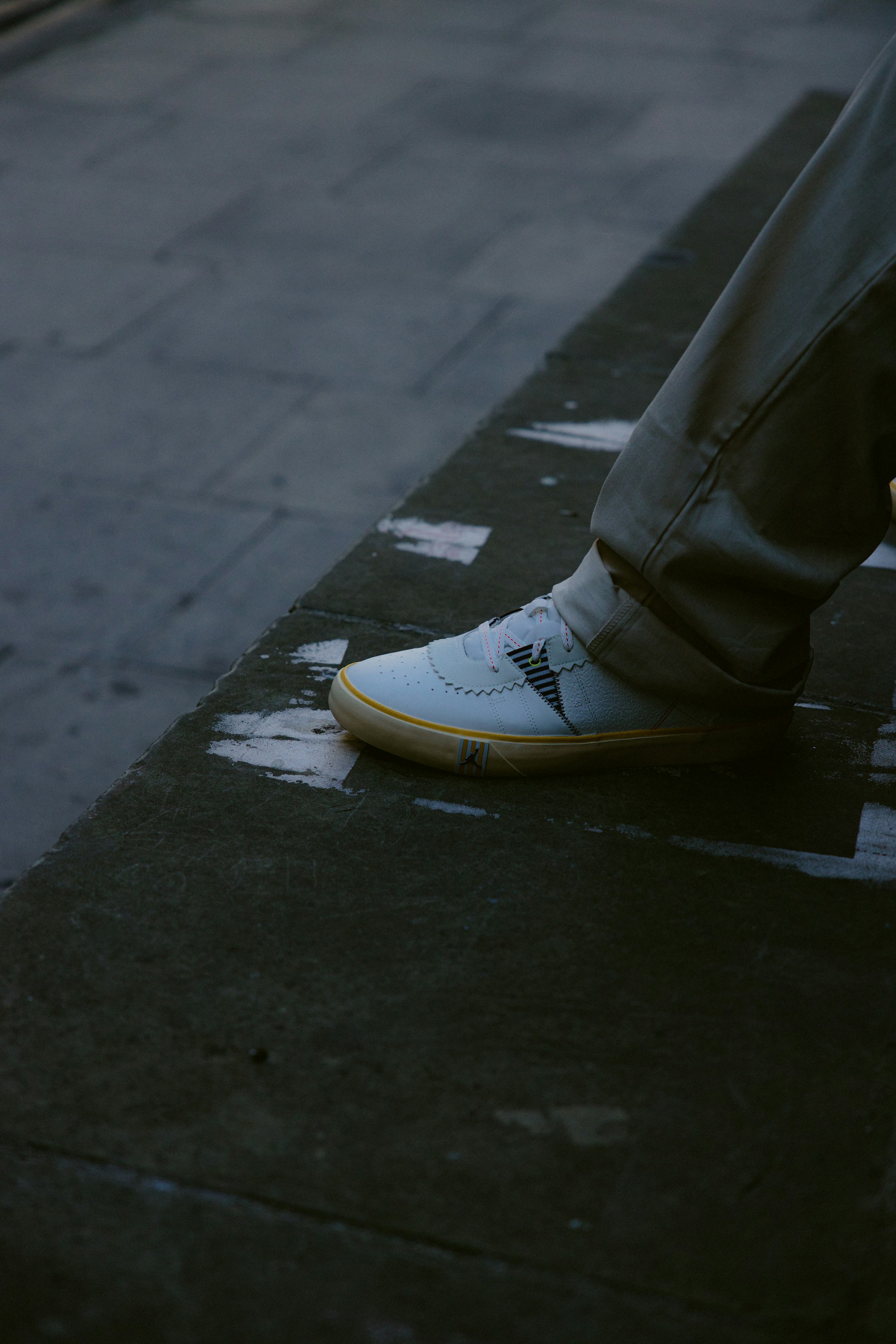 a person's leg and shoes