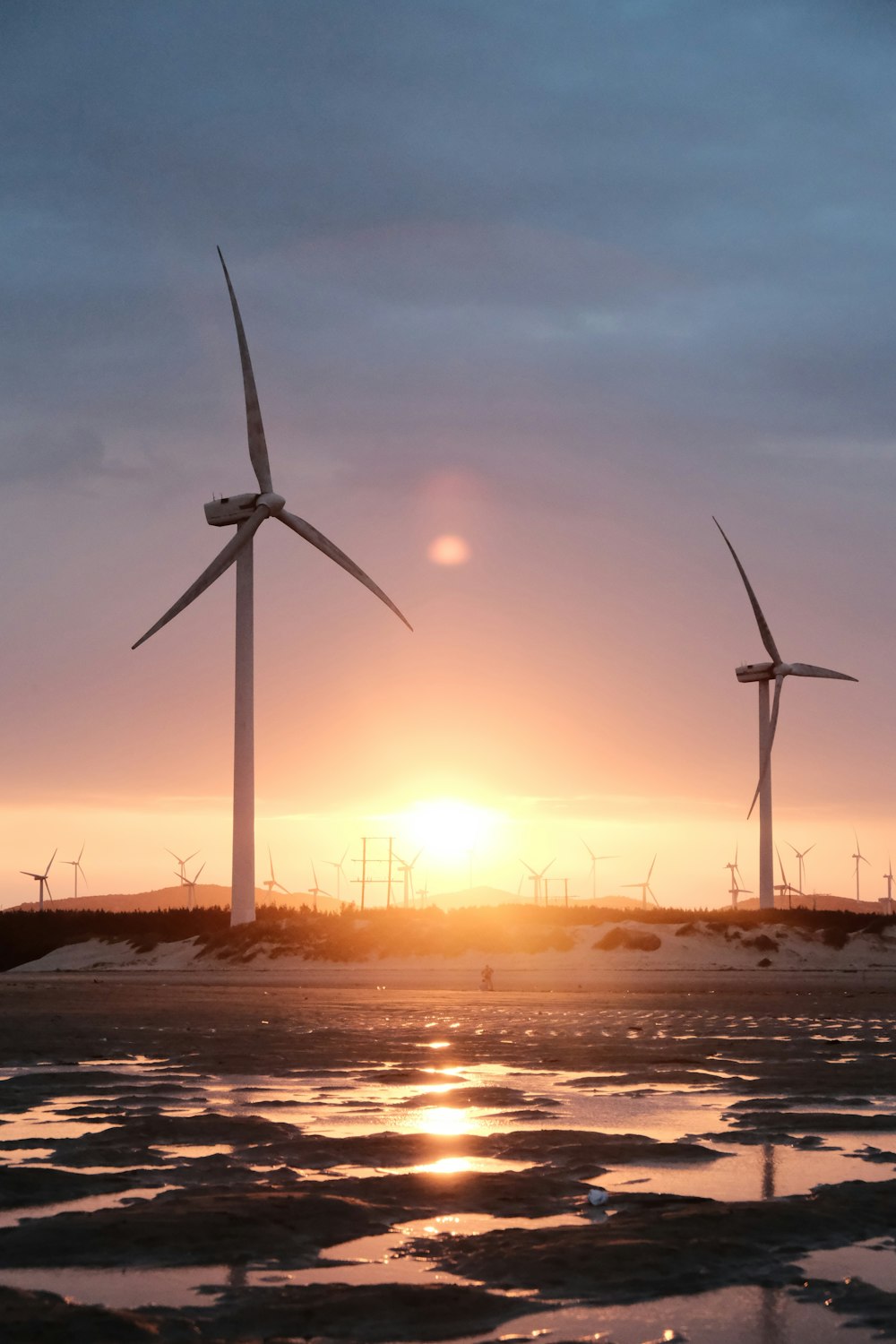 a group of wind turbines