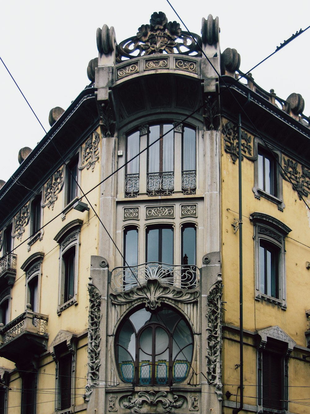 a building with a statue on top