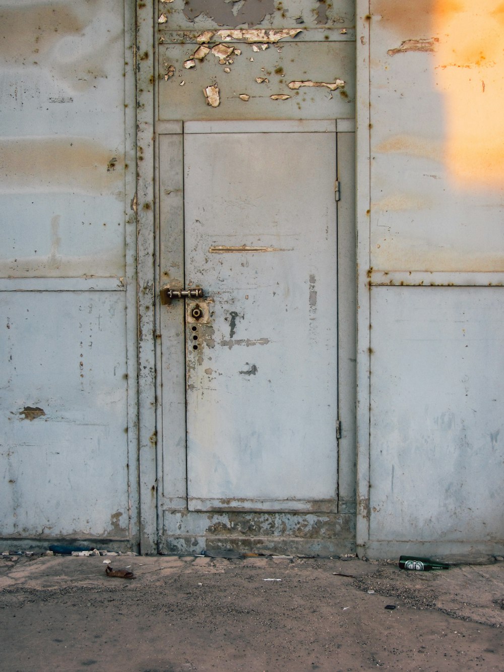 a white door with a hole in it