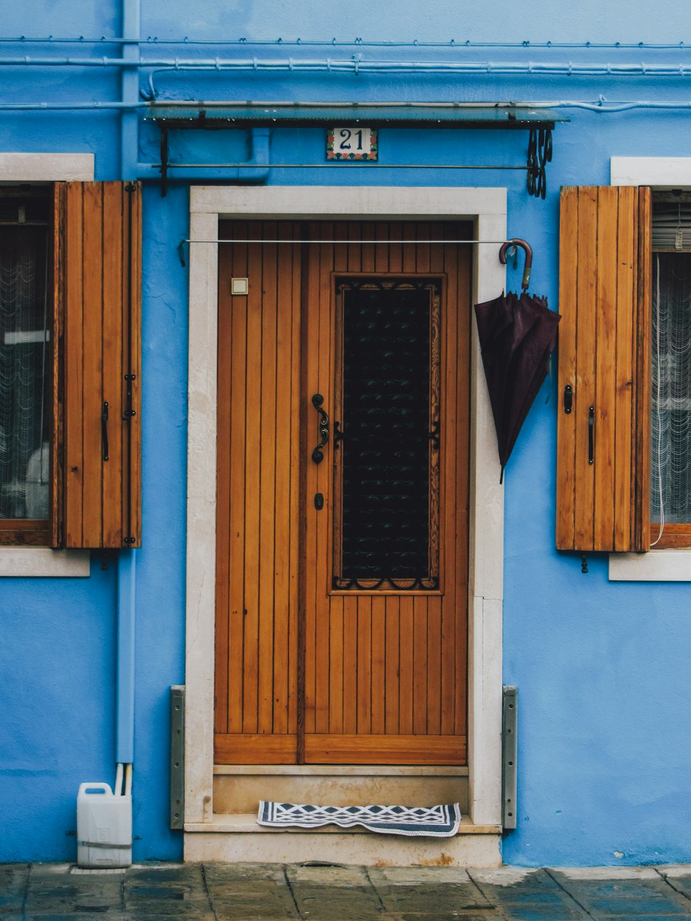 a door in a blue building