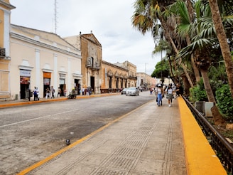 a street with people and cars