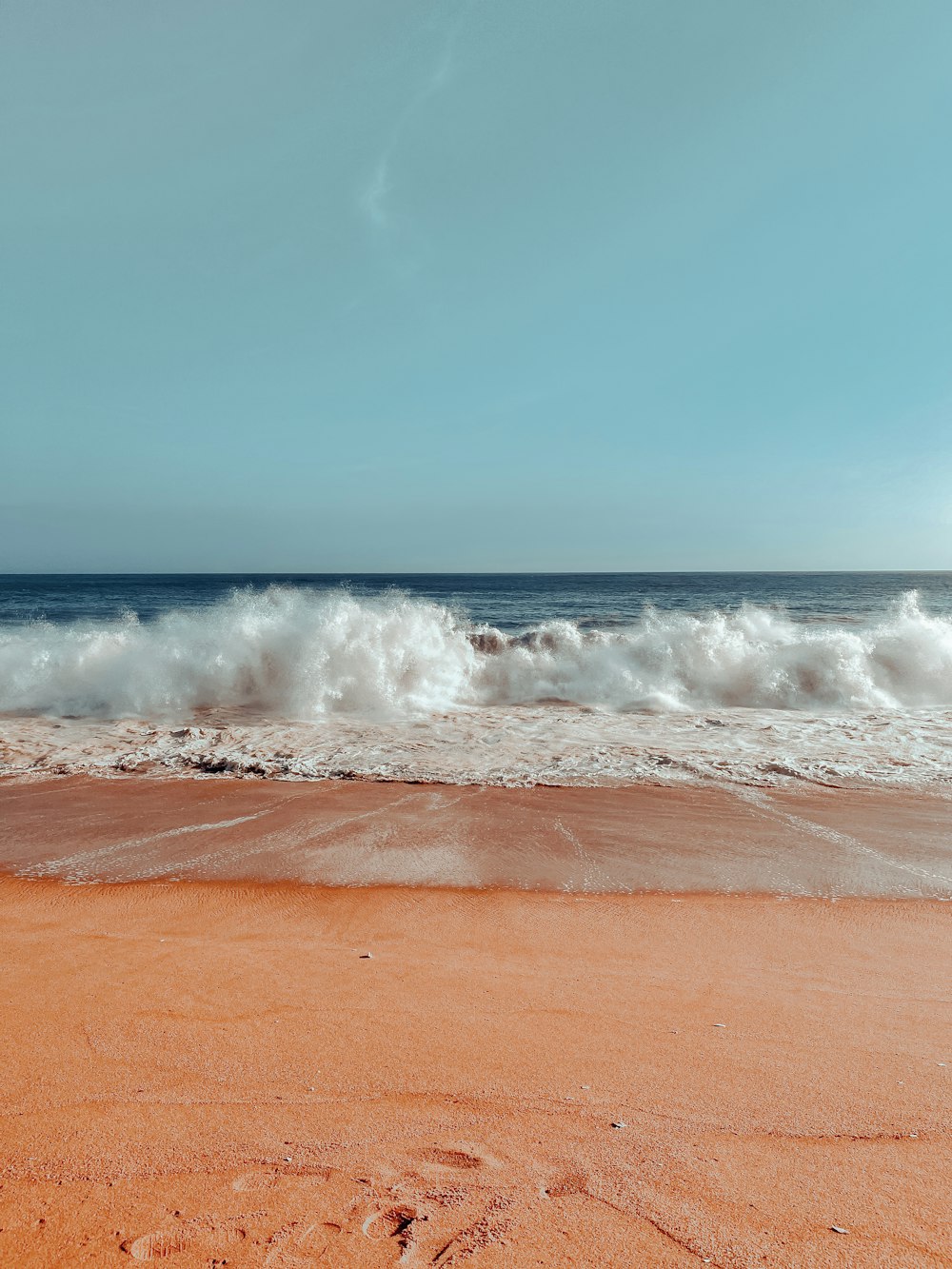 waves crashing on a beach