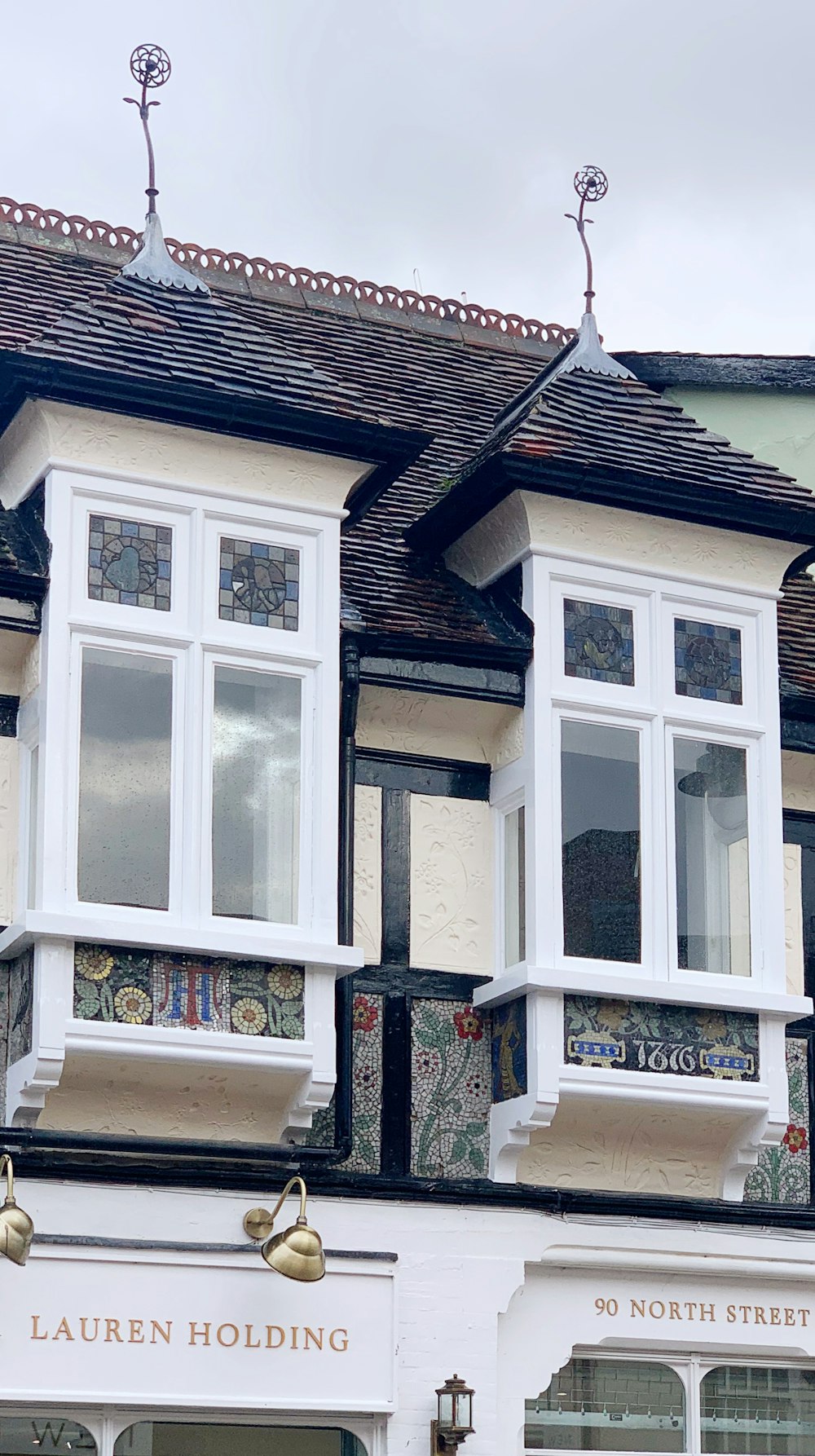 a building with windows and a sign on the side