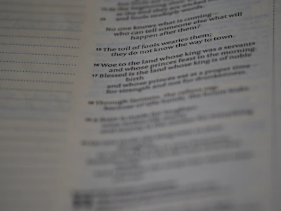 An open copy of 'The Absenteeism Iceberg' showing a highlighted excerpt about workplace absenteeism.