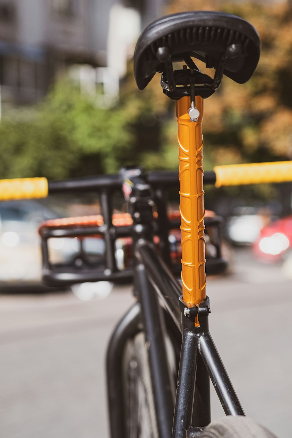 a bicycle with a yellow pole