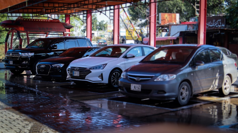 a group of cars parked in a parking lot