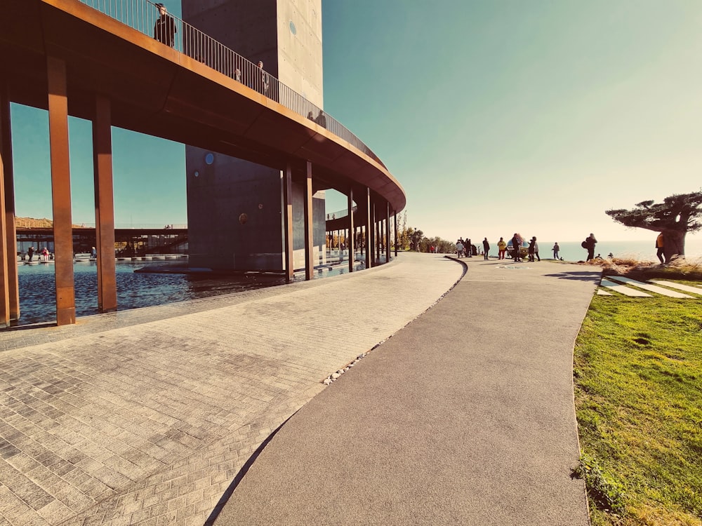 a walkway with people walking on it