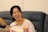 A happy customer smiling while watching Taro's videos.