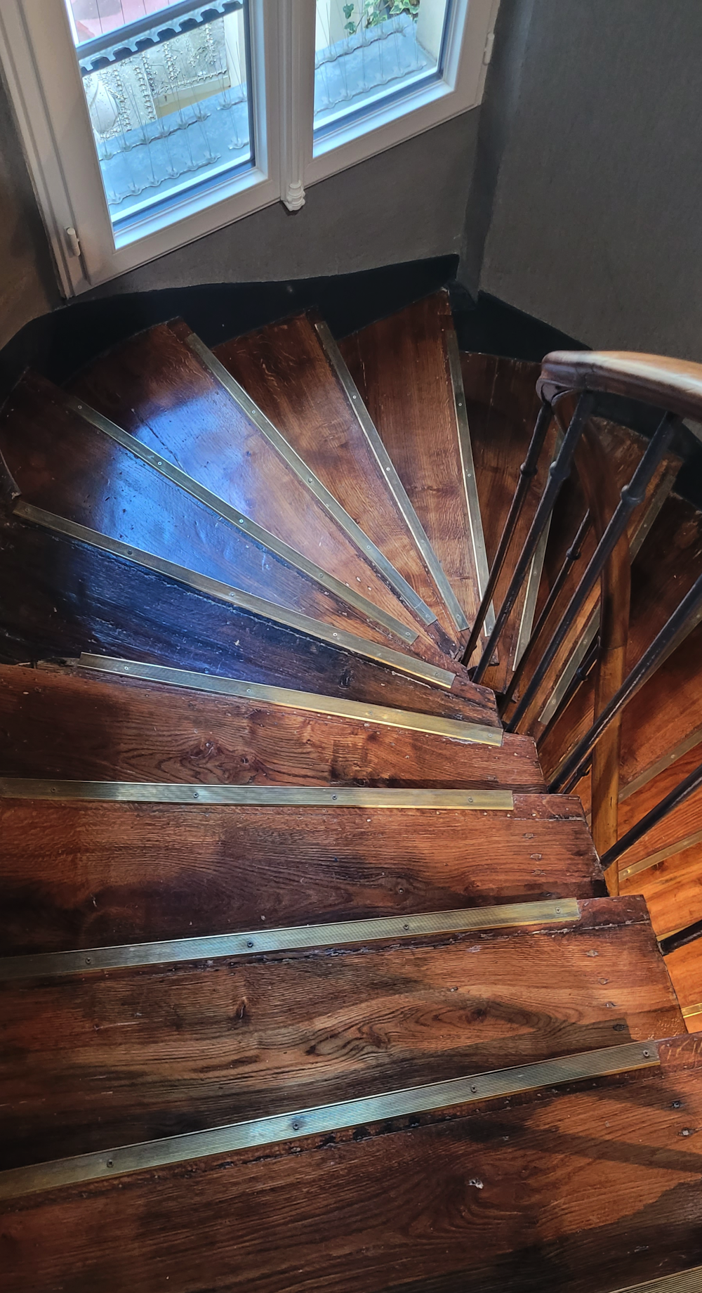 a wooden chair in a room