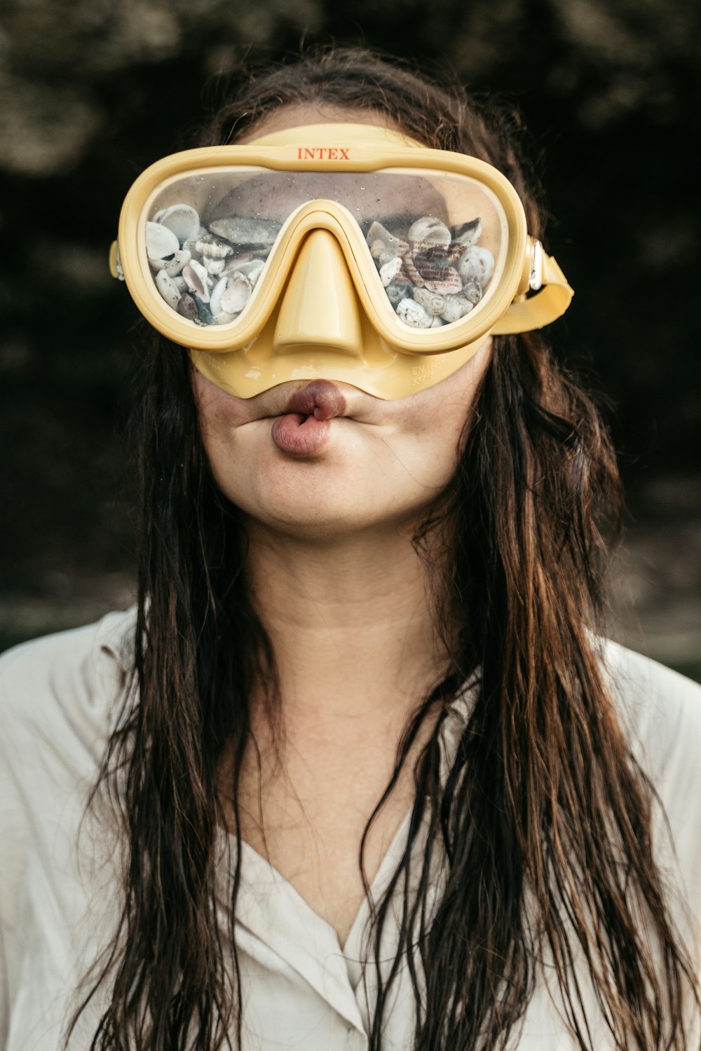 a woman wearing a virtual reality goggles