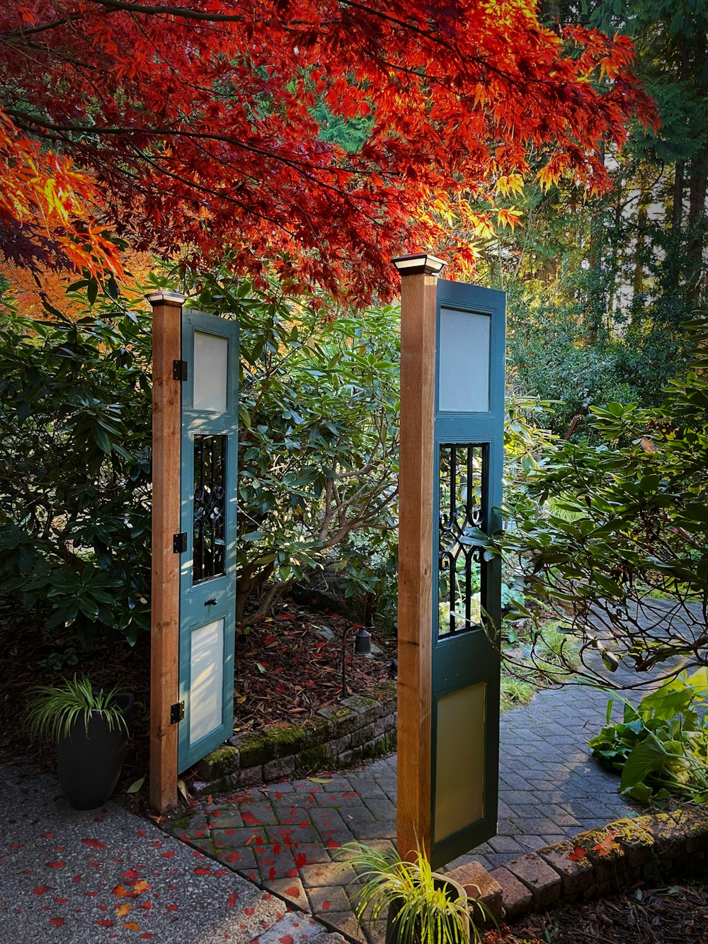 a telephone booth in a garden