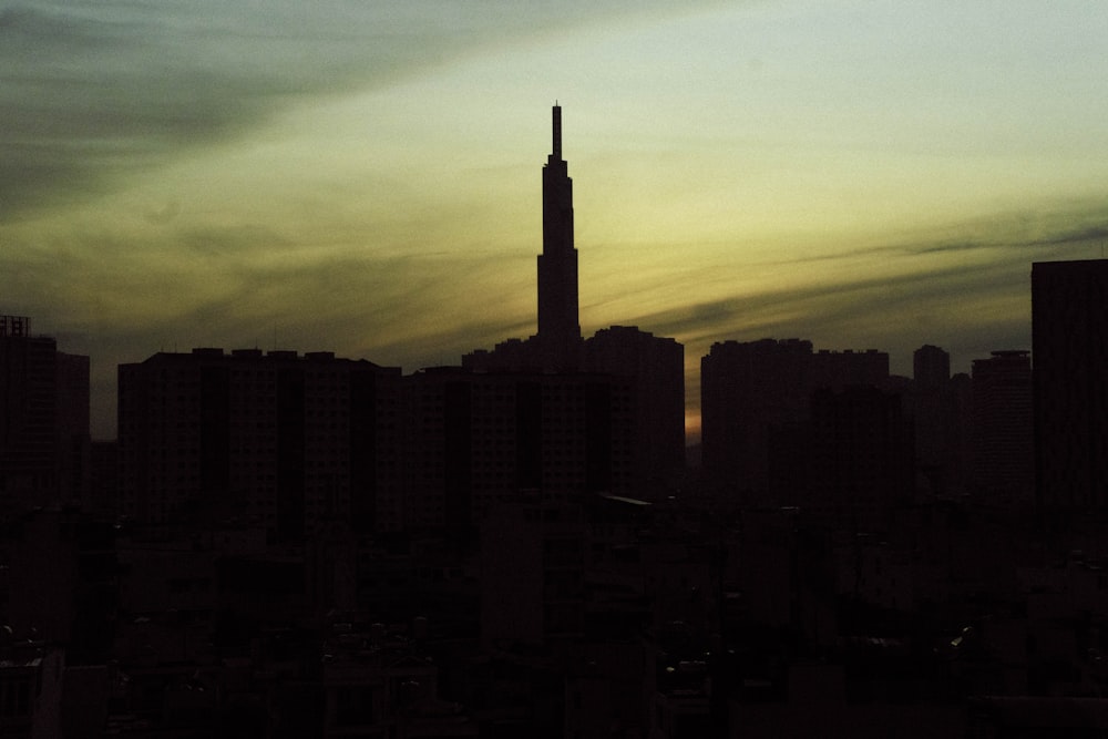 a city skyline at sunset