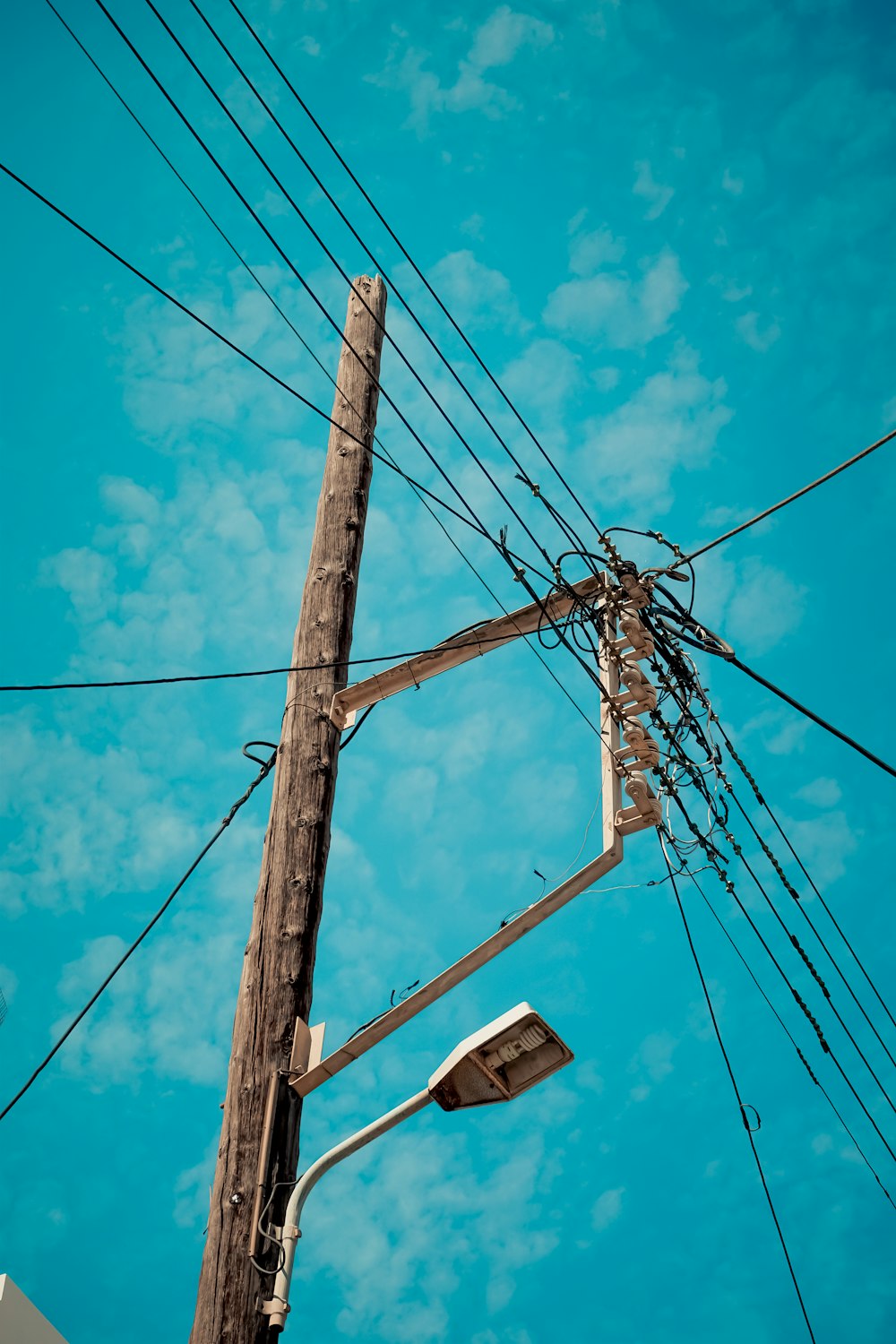 a telephone pole with wires