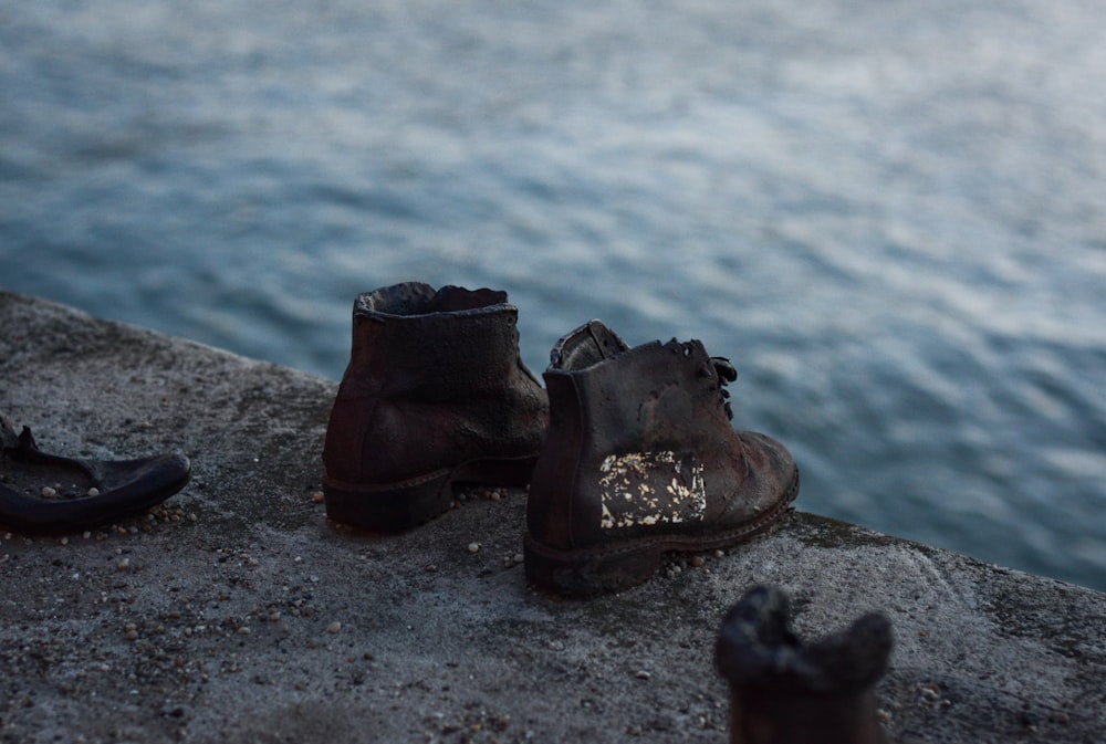 a group of shoes on a beach