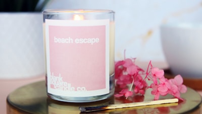 a candle in a glass jar