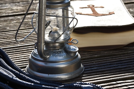 a metal object on a wood surface