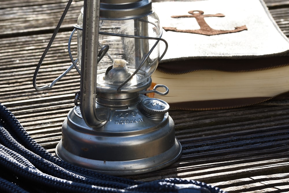 a metal object on a wood surface