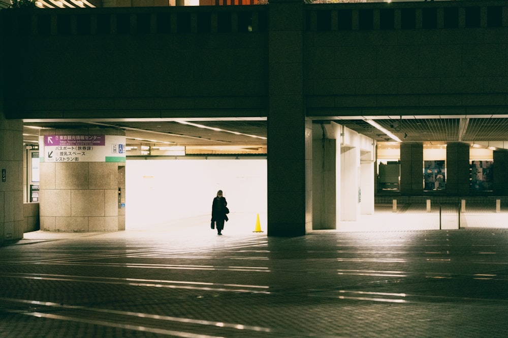 a person walking in a large building