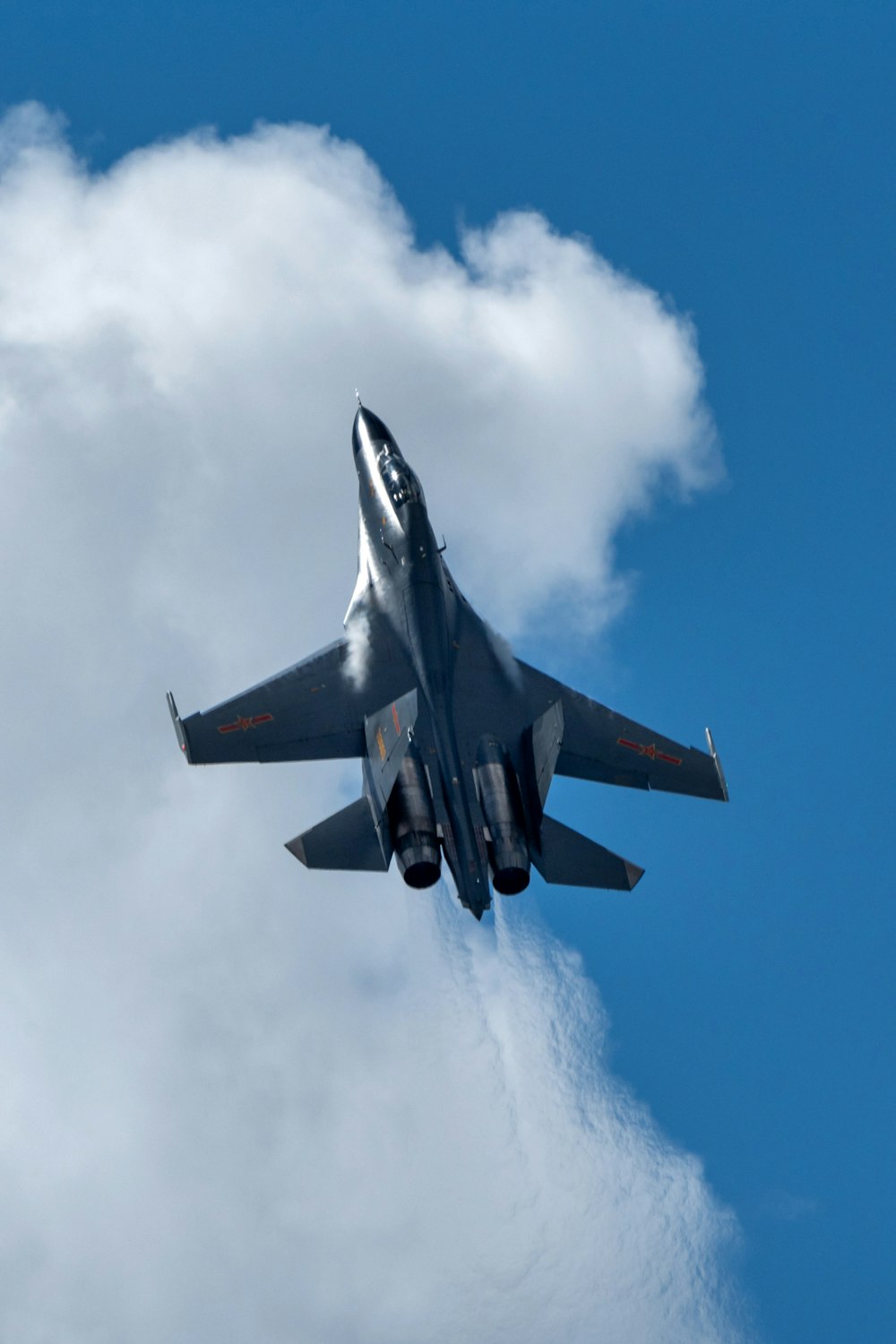 a fighter jet flying through the air