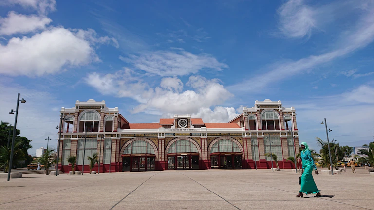 Exterior shot of the Royal Health building in Mexicali under a clear blue sky.
