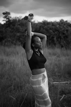a woman posing in a field