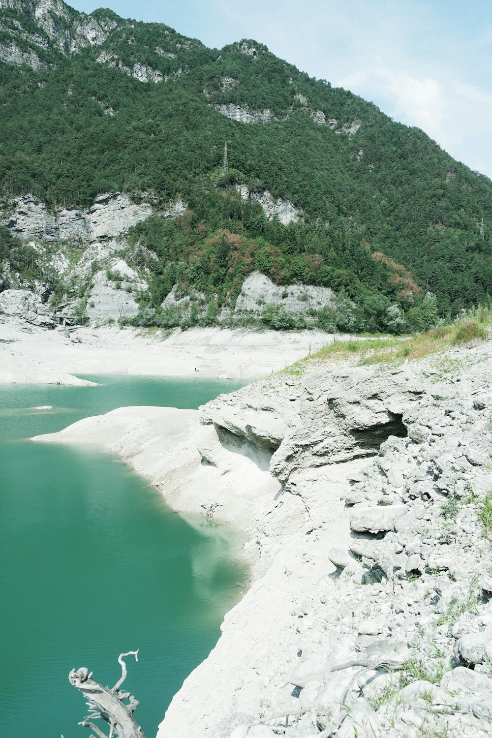 a beach with a mountain in the background