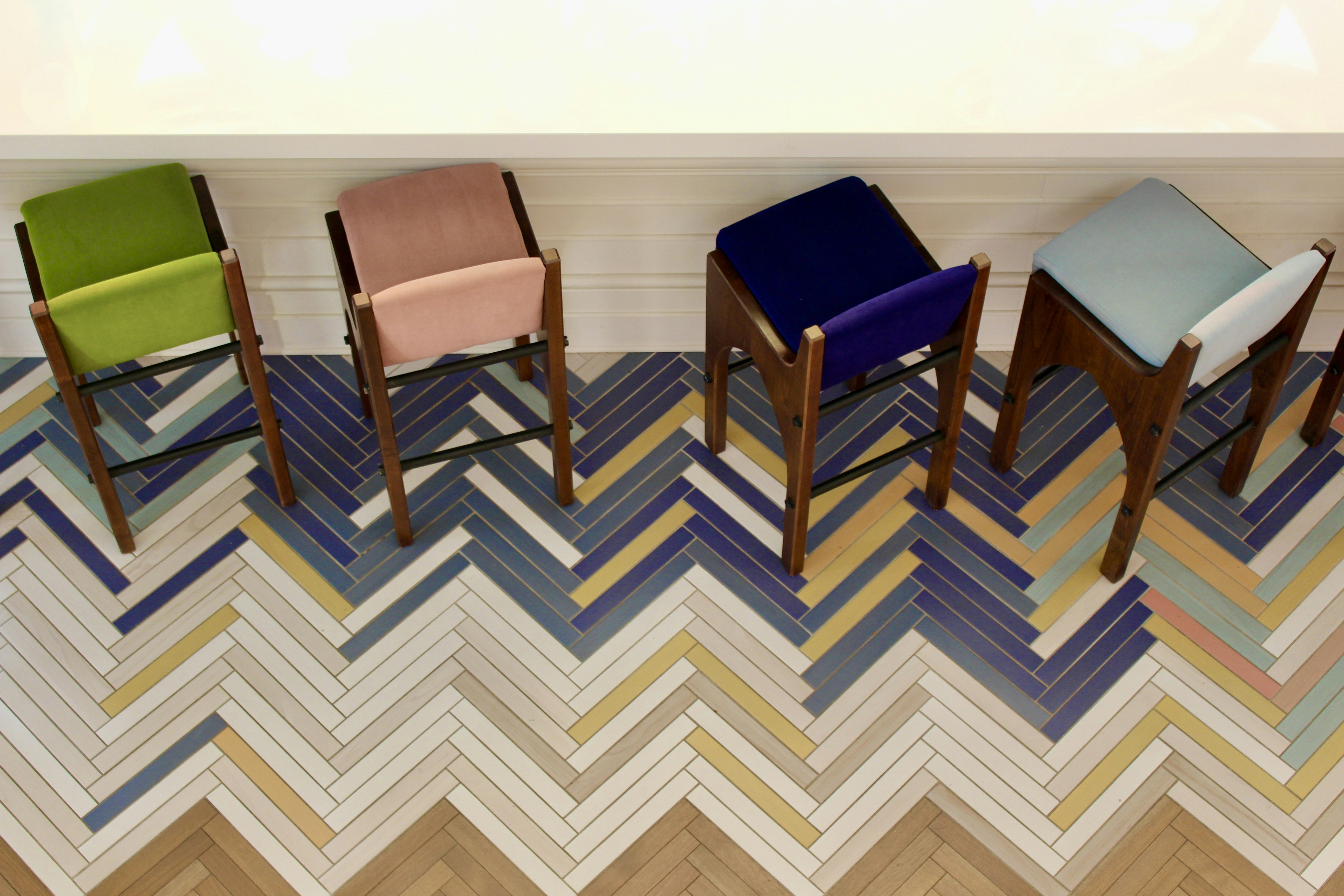 a group of chairs around a table