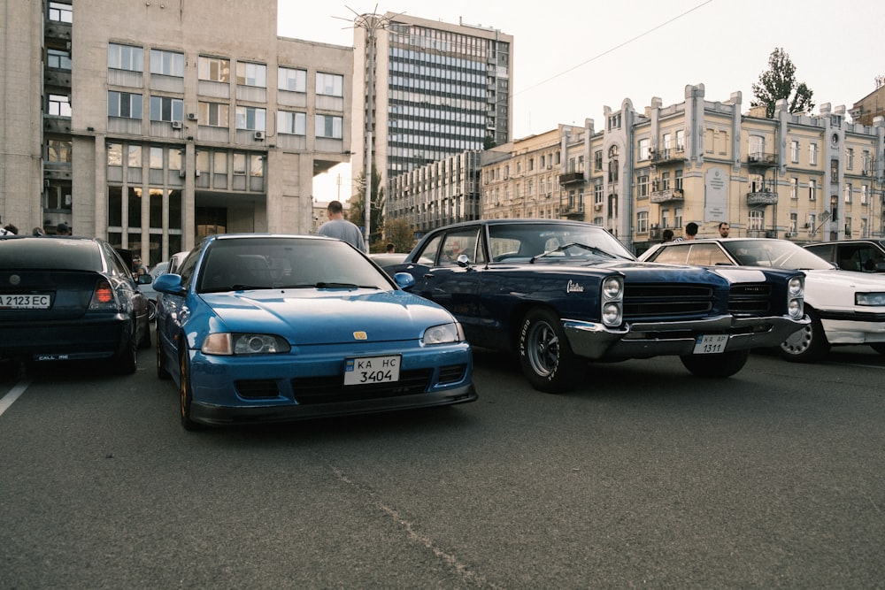 a group of cars parked in a parking lot