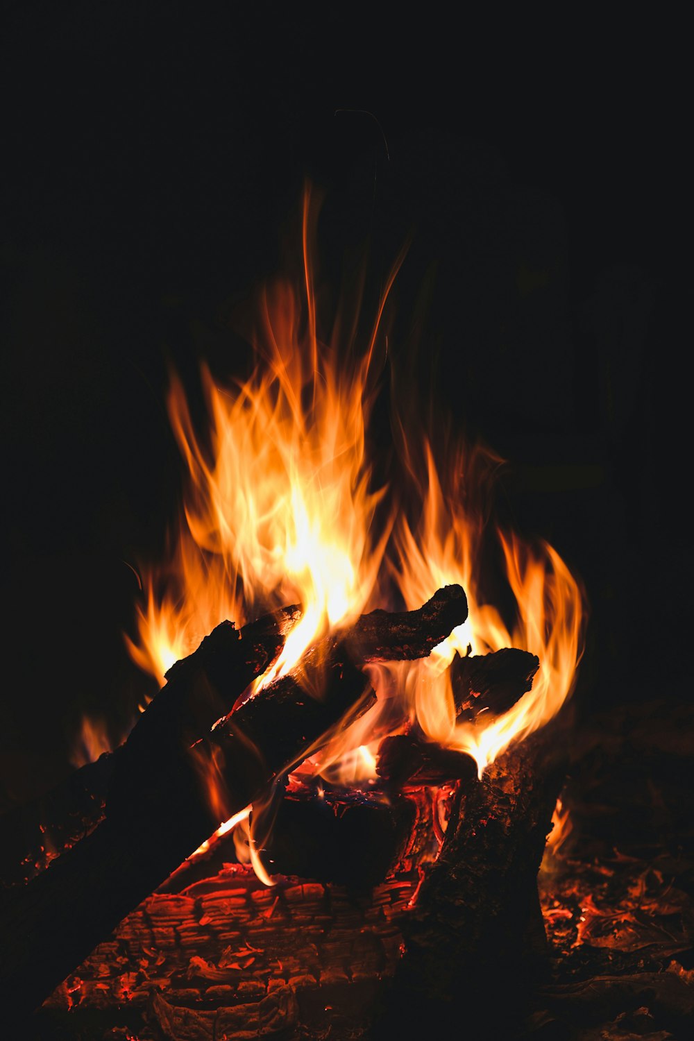 a fire burning in the dark