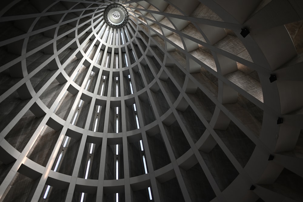 a spiral staircase with glass walls