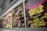 A vibrant album cover showcasing vintage synths and electronic elements.