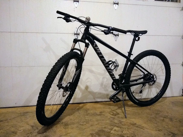 A rugged mountain bike carefully positioned for safe door-to-door transport.