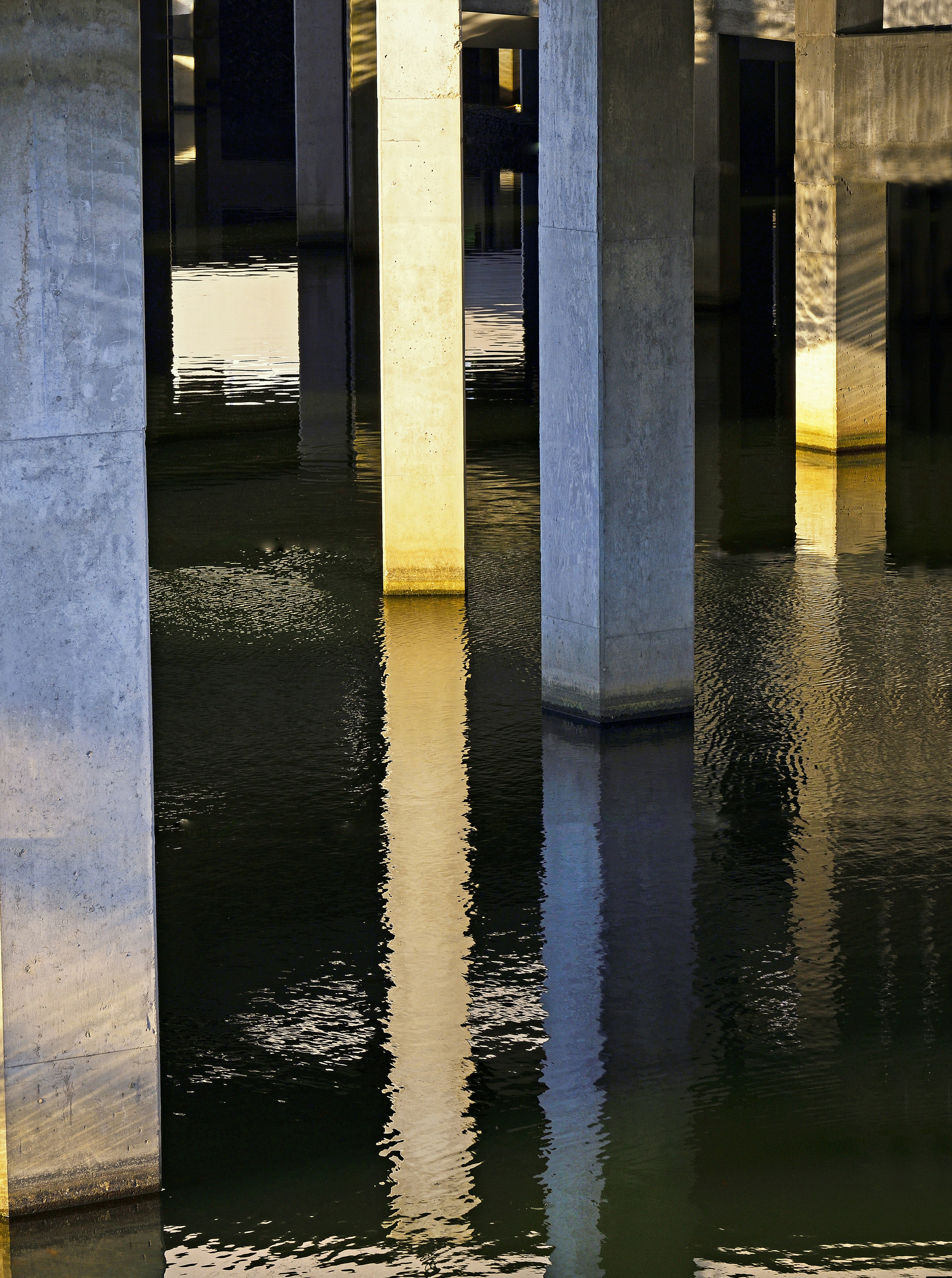 a flooded area with pillars