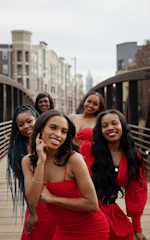 a group of women posing for a photo
