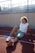 a woman stretching on a track