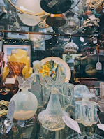 Acrylic cases showcasing delicate items, with reflections highlighting the material’s clarity.
