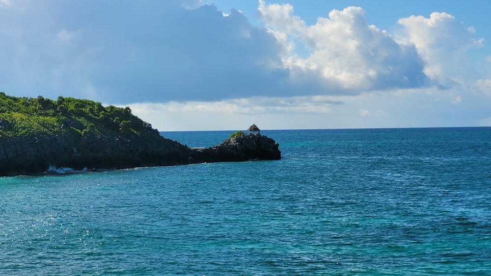 a body of water with land in the distance