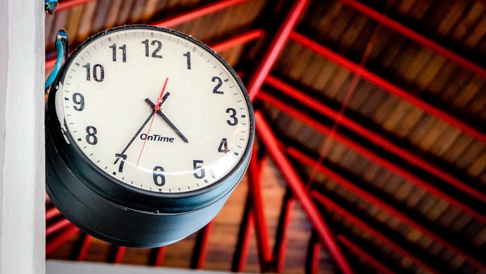 a clock on a shelf