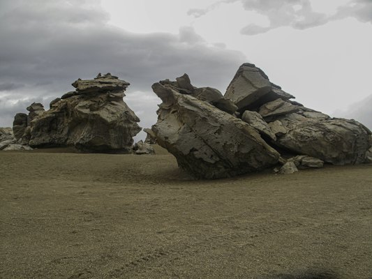 A rocky mountain with a large stack of rocks on top — Atacama Desert, Chile