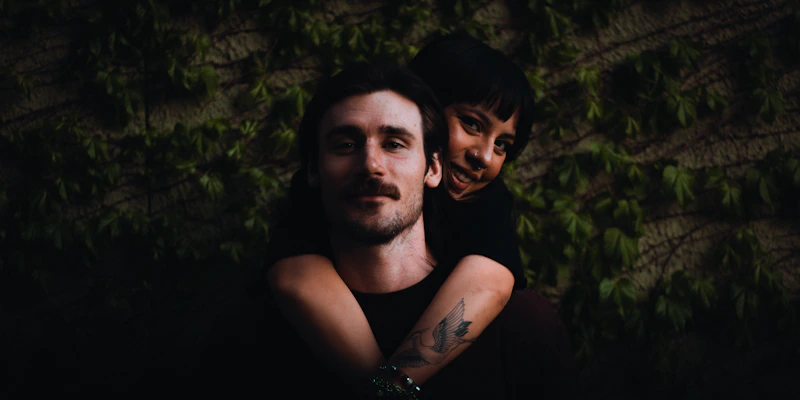 a man and woman posing for a picture