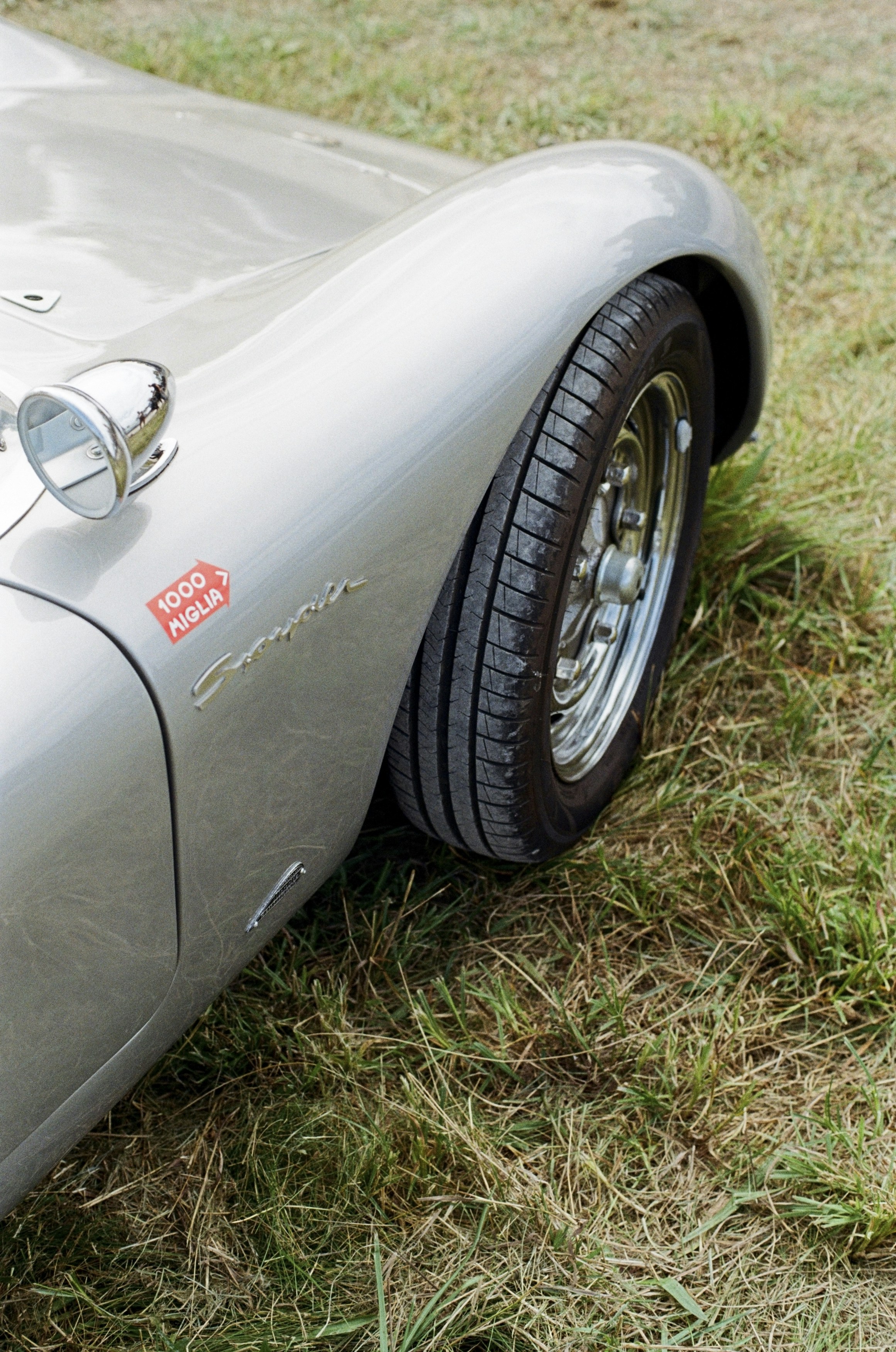 a car parked in a grassy area