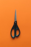 a pair of scissors on a wall