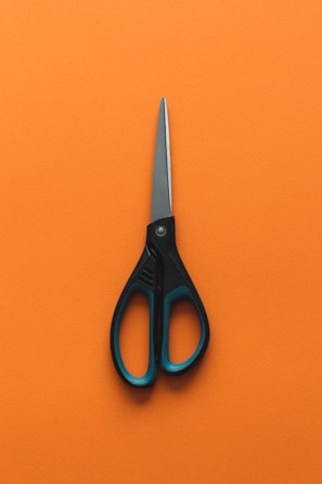 a pair of scissors on a wall