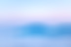 a blue sky with a few clouds