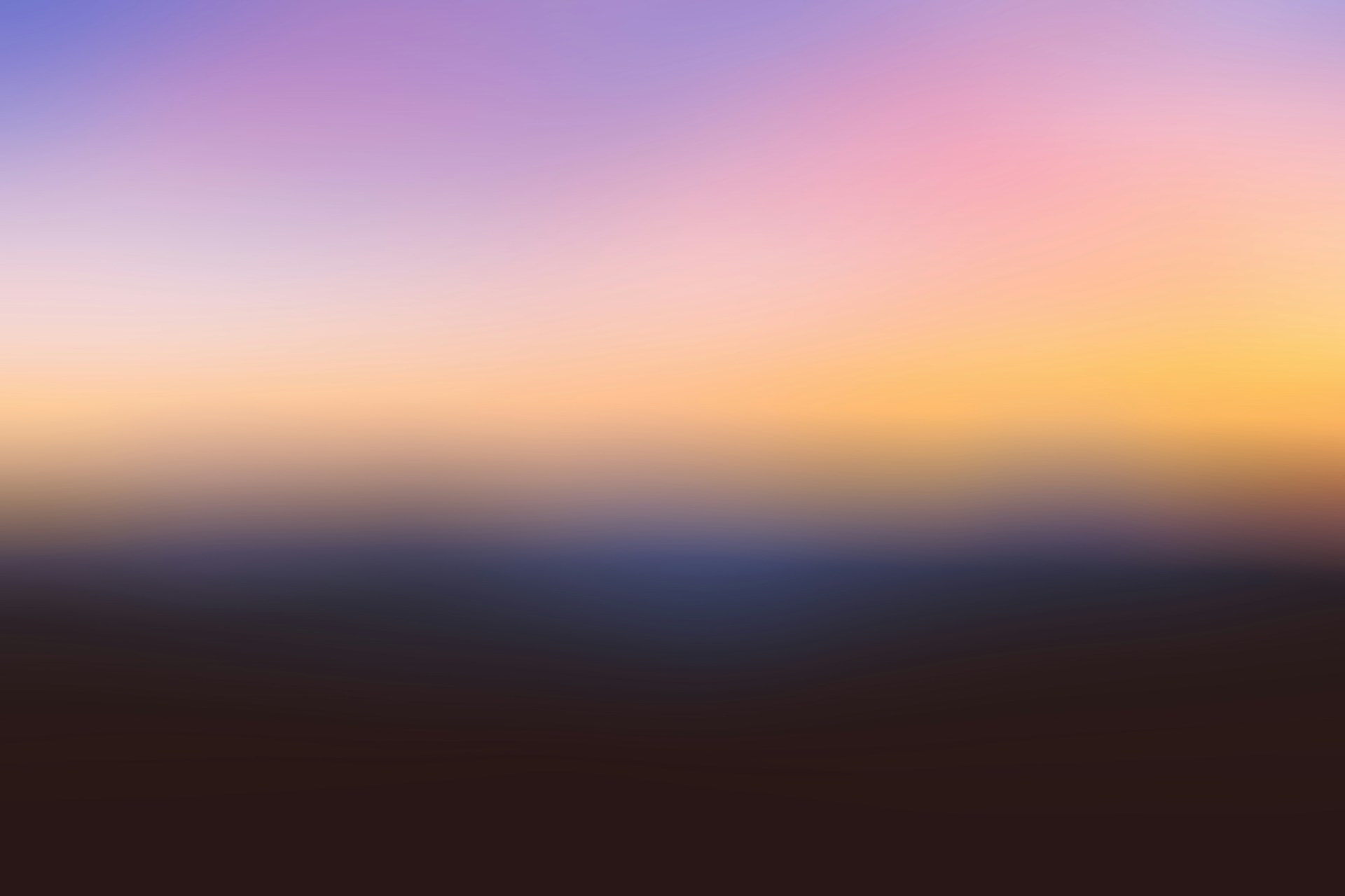 a sunset over a large body of water