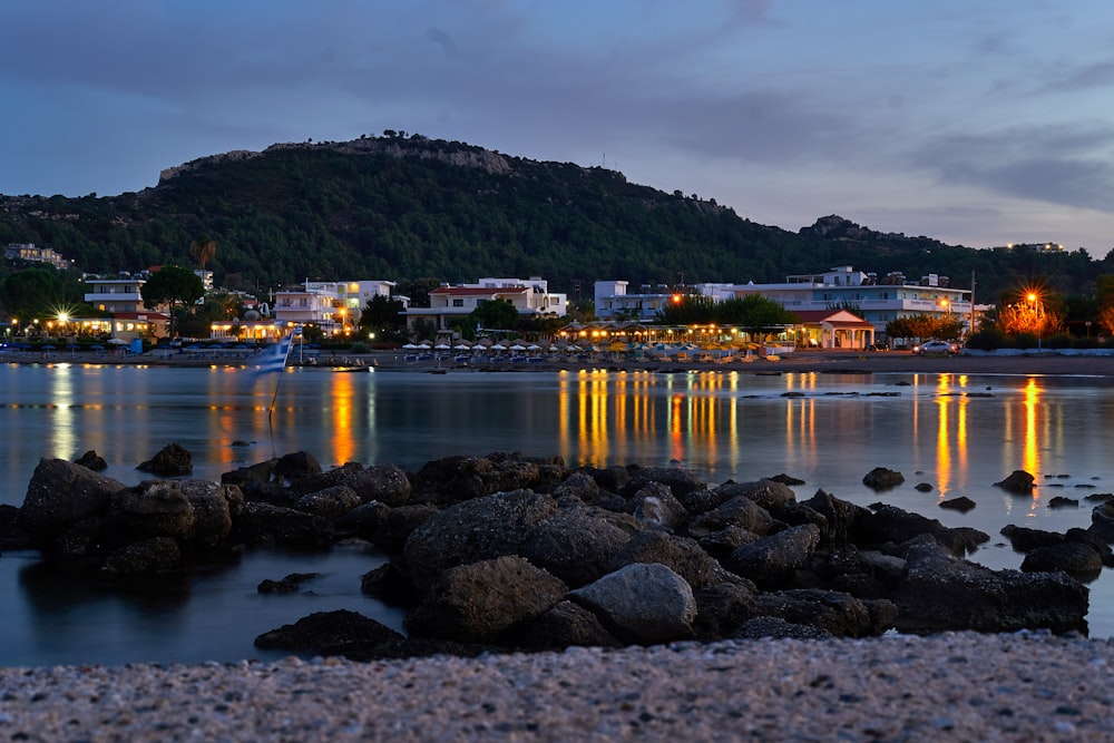 a beach with a town in the background