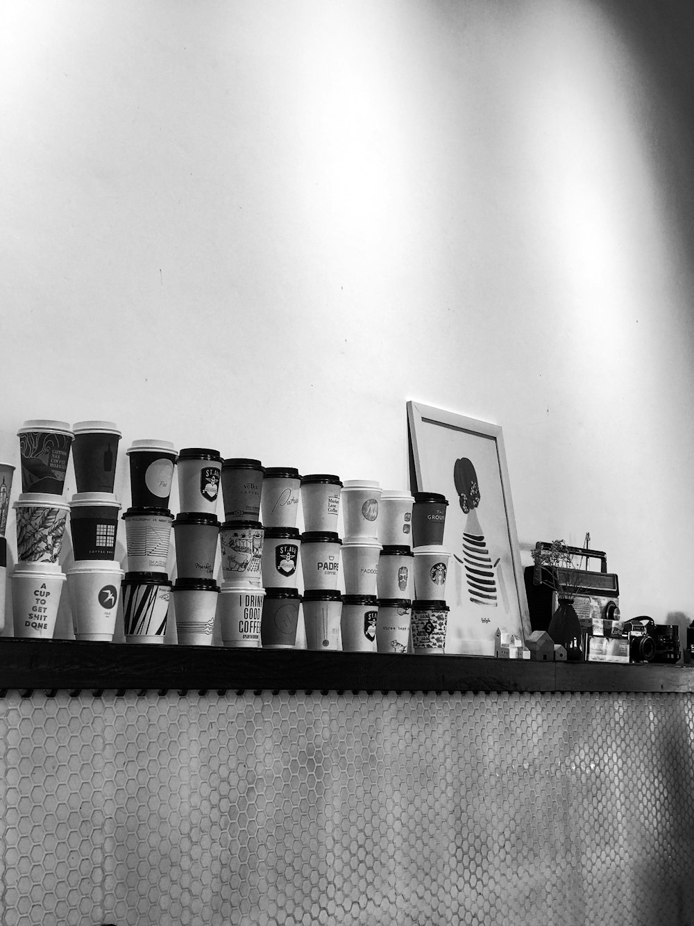 a shelf with a group of objects on it